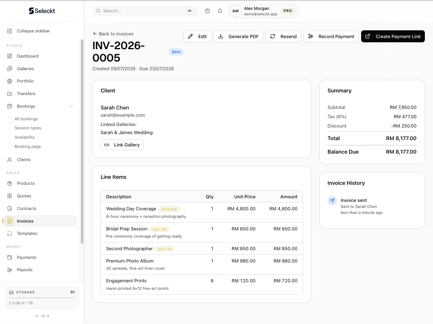 Invoice detail with client, itemized line items, tax, totals, and payment actions.